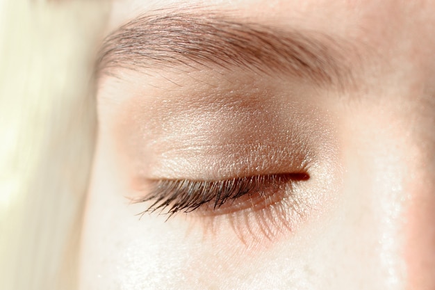 Closed eye of a young girl, beauty shot