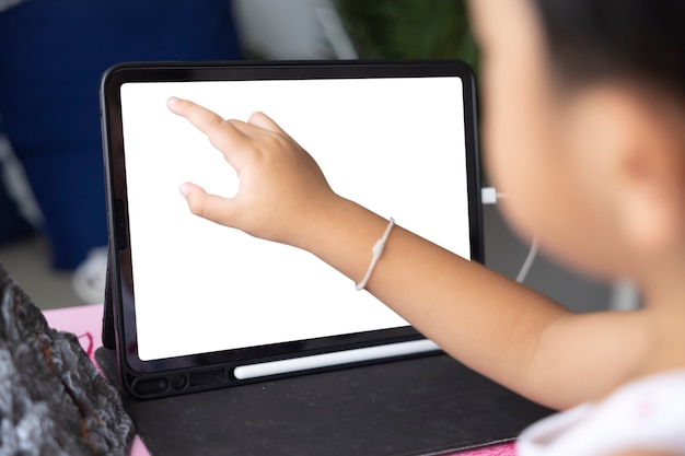 Closeup Asian boy studying through online elearning system Have video call distant class