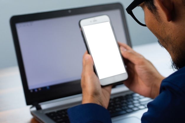 Closeup Asian man using mobile phone business online , Smartphone connection technology