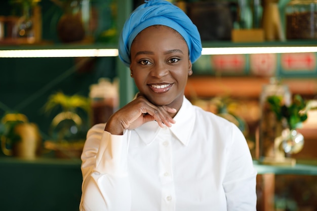 Closeup of attractive african american lady posing at cafe