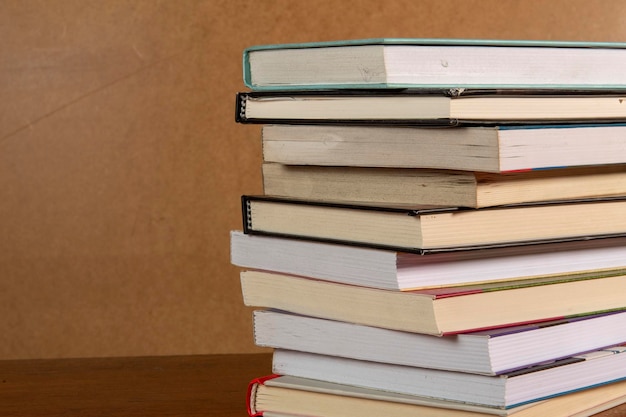 Closeup of background stack of old used books Pile of vintage old books Back to school copy space