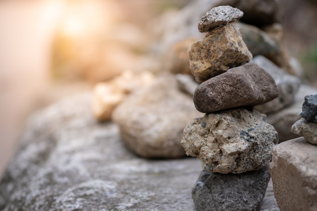 Closeup of balancing rock stack pyramid for mediation and harmony concept. 