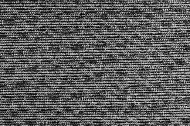 Closeup black ,dark grey color fabric sample texture backdrop. Dark grey fabric strip line pattern design,upholstery for decoration interior design or abstract background.