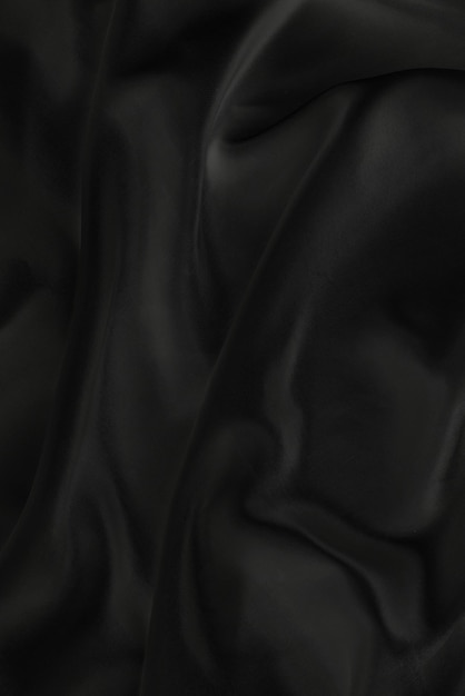 Closeup of black smoot fabric as a background.