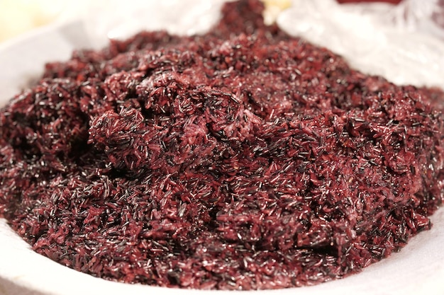 Closeup of black sticky rice thai street food market