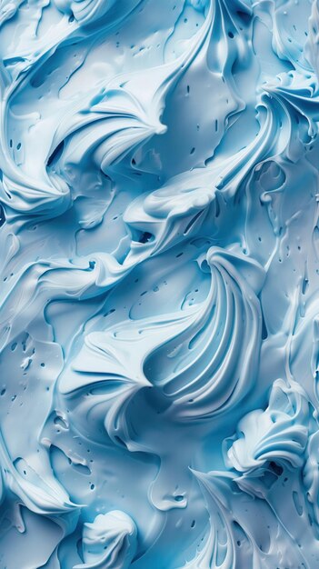 Closeup of blue icing frosting with smooth creamy texture backgrounds and wallpapers