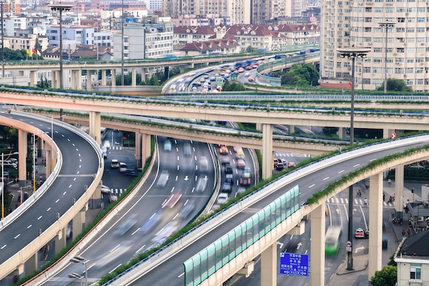 Closeup of car motion blur on highway viaduct at dusk in shanghai