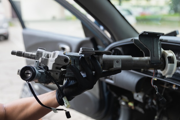 Closeup car steering wheel repair after the accident