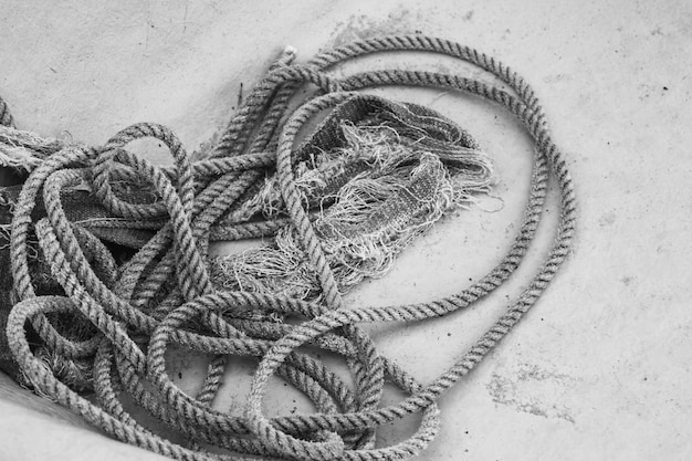 Closeup of coil of nautical rope on fishing boat hull