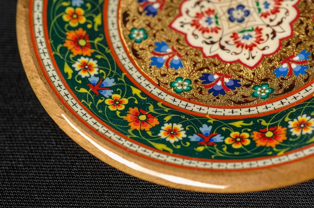 A closeup of a colorful artistic painting on a plate