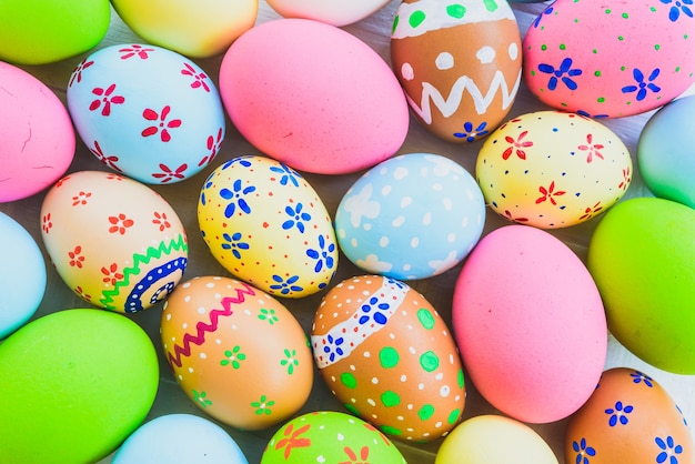 Closeup Colorful Easter eggs background. Happy family preparing for Easter.