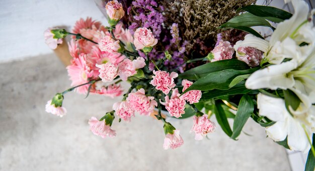 Closeup of colorful flowers arrangment on the floorc