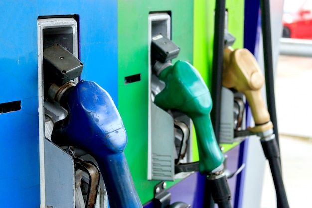 Closeup of colorful fuel pumps at a gas station