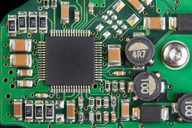 Closeup of computer chip on a part of electronic printed circuit board