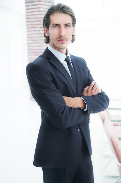 Closeup. confident businessman on background of office