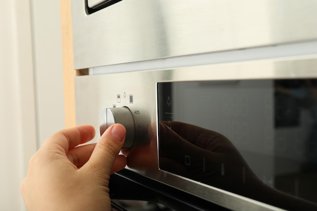 A closeup of the control panel of a modern dishwasher