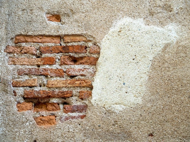 Closeup cracked concrete brick wall background