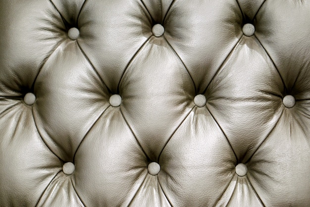 Closeup and crop Black sofa Leather background.