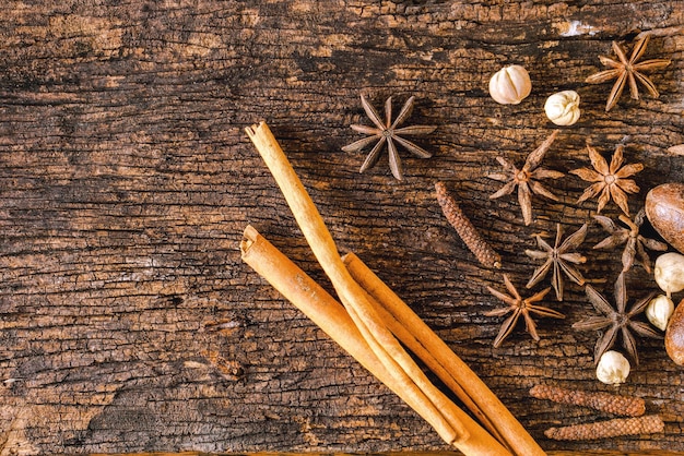 Closeup and crop Dry spices or herbs on old wood background