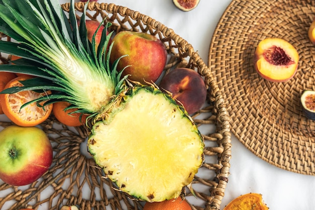 Closeup cut pineapple and other exotic fruits