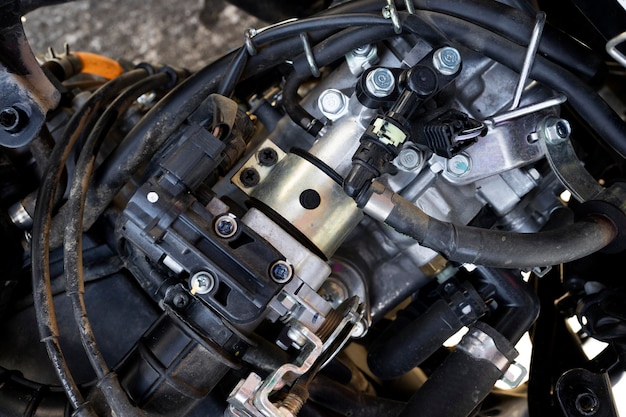 Closeup detail of motorcycle engine in service center