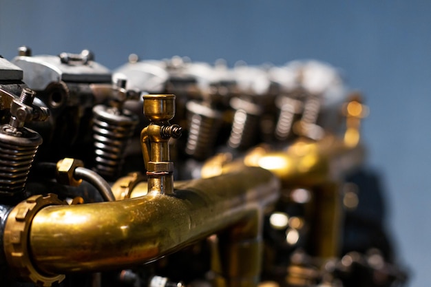 Closeup of a detail of a rare car engine Metal mechanisms Automotive industry