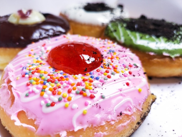 A closeup of a donut full of flavor and color