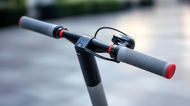 Photo closeup of an electric scooter handlebar with red and gray grips