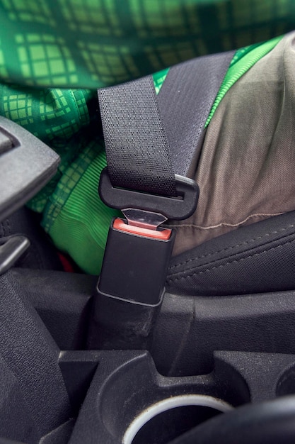 Closeup of fastened seat belt of a car Concept of safety