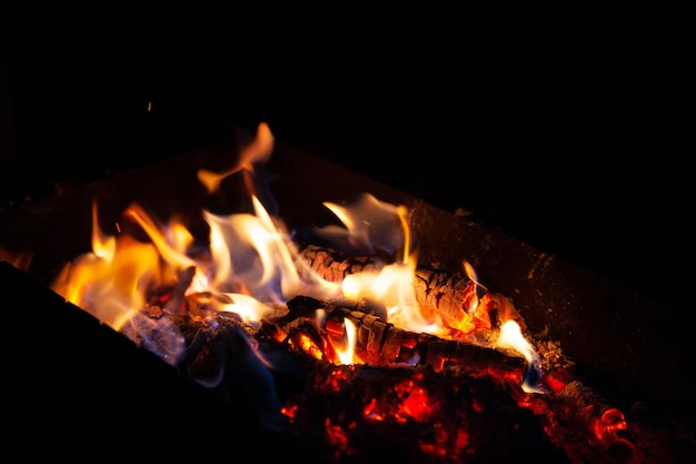 Closeup fire bonfire The flame of fire burns in an open furnace at night