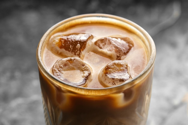 Closeup on glass of iced coffee latte