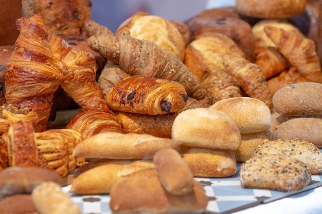 Closeup of a group of freshly baked and delicious looking breads and pastries