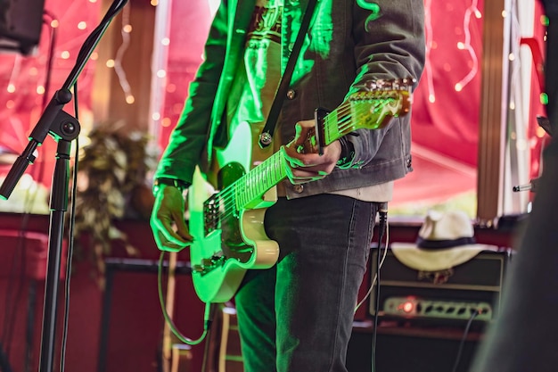 Closeup of Guitarist Playing Live in Small Venue