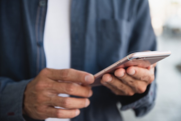 Closeup  hand using smartphone , mobile phone internet technology