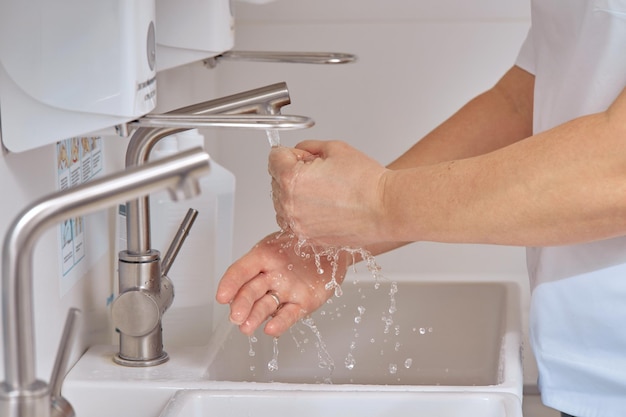 Closeup of hands during washing