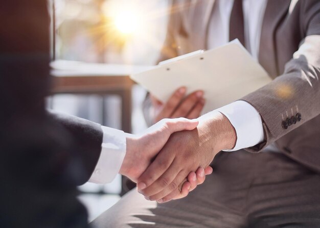 Closeup of handshake of business partners