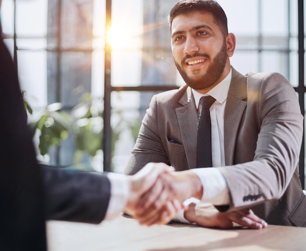 Closeup of handshake of business partners