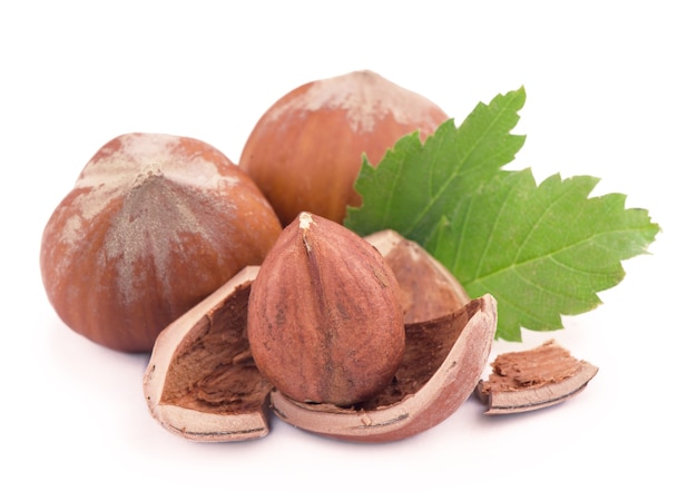 Closeup of hazelnuts, isolated on the white, clipping path included.