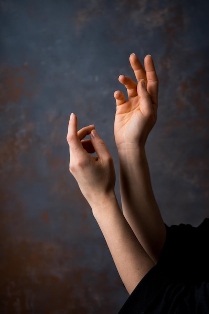 Closeup image of beautiful woman39s hands with light pink manicure on the nails