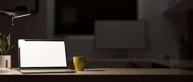 Closeup laptop computer mockup and copy space on table in modern dark office at night 3d render