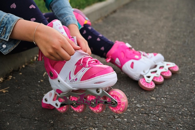 Closeup Of Legs Wearing Roller Skating Shoe Outdoors