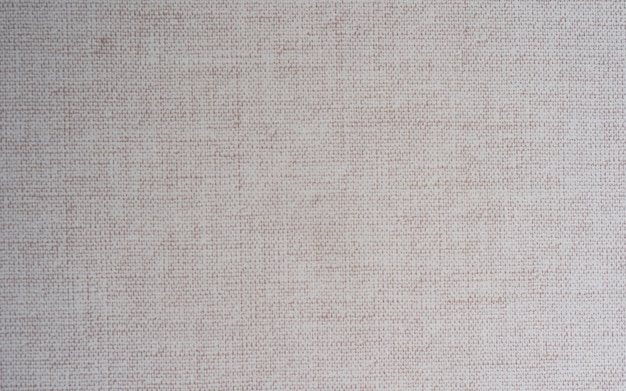 Closeup light creme, beige color fabric texture carpet