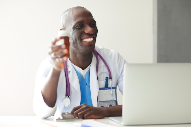 Closeup of male doctor giving jar of pills to patient Doctor Pill