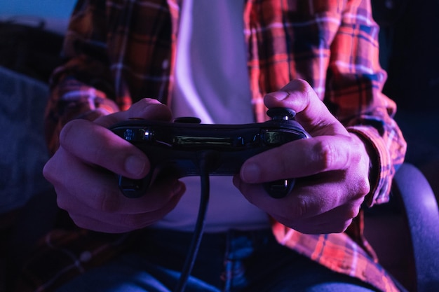 Closeup of a man with a video game controller