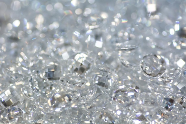 Closeup of many small white zirconia gemstones Bright luxury background