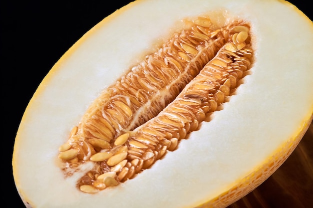 Closeup of melon halve on a wooden board