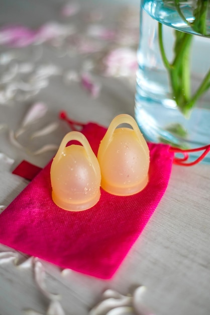 Closeup of a menstrual cup in the bathroom