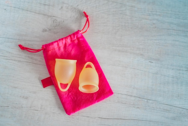 Closeup of a menstrual cup in the bathroom