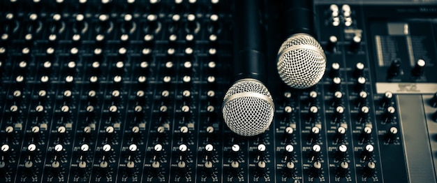 Closeup microphone and sound mixer in studio for sound record