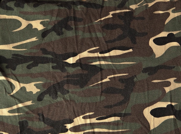 Closeup of military uniform surface Texture of fabric closeup military coloring